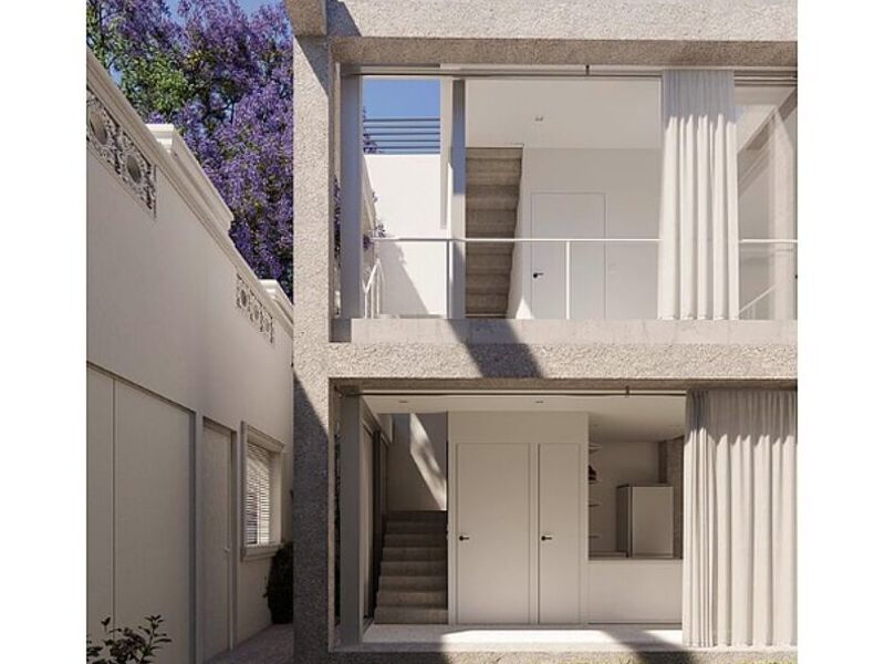 casa gris dos pisos Argentina - IGNACIO ZSULMAN ARQUITECTO | Construex